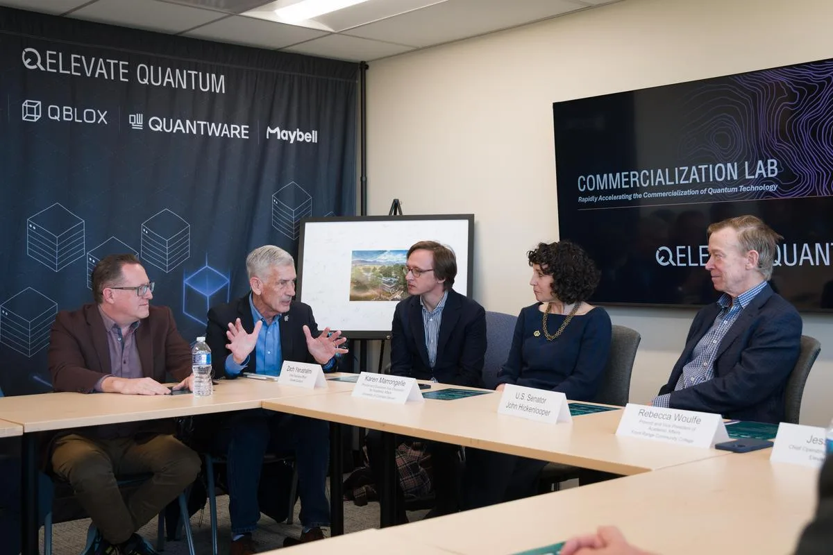 Mines President Paul C. Johnson speaks with U.S. Senator John Hickenlooper and a team of executives about Elevate Quantum, an industry partnership project.