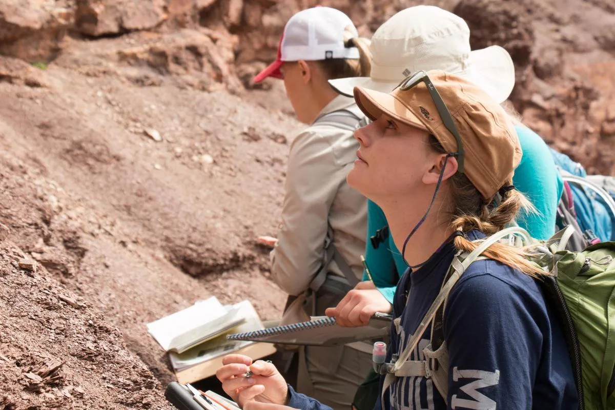 Mines Geology students performing observations in a field session.