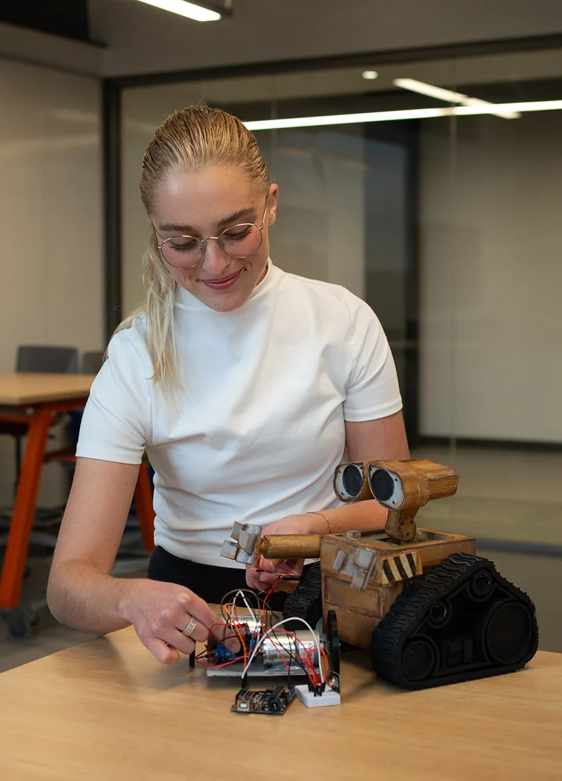 Mines student building a robot