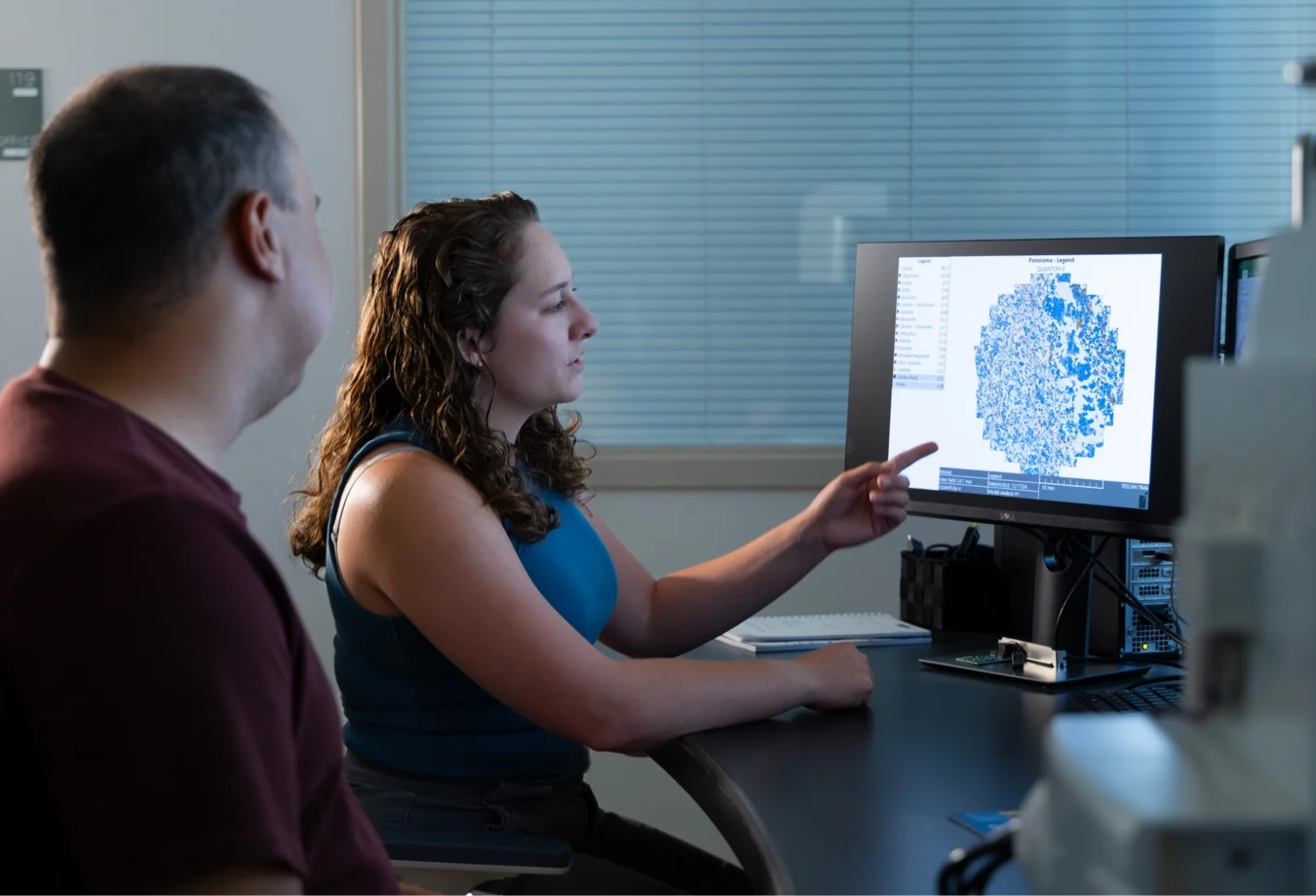 Mines researchers analyzing bioinformatics data, a field focused on processing genetic information for medical advances.
