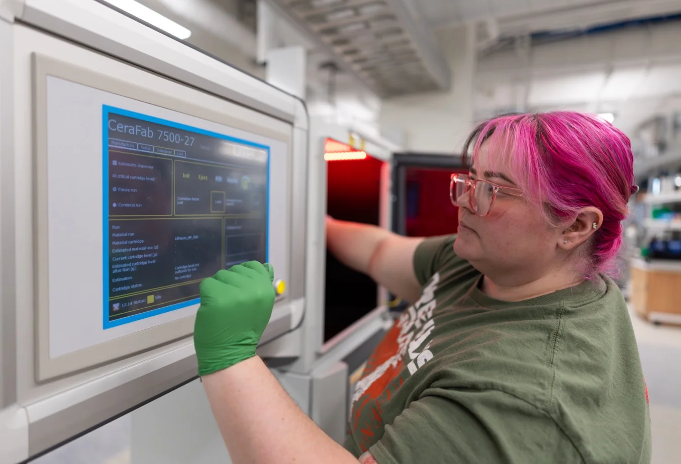 A Mines student operating a Lithoz CeraFab 7500 ceramic 3D printer.
