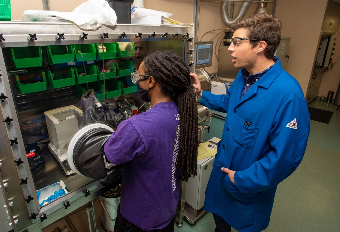 Chemistry graduate student Darius Hayes works in the glovebox in the McGuirk Lab, which focuses on interdisciplinary research at the interface of synthetic chemistry and materials science — including carbon capture.