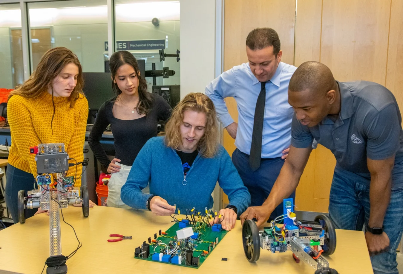 Mines students collaborating on a  robotics engineering project