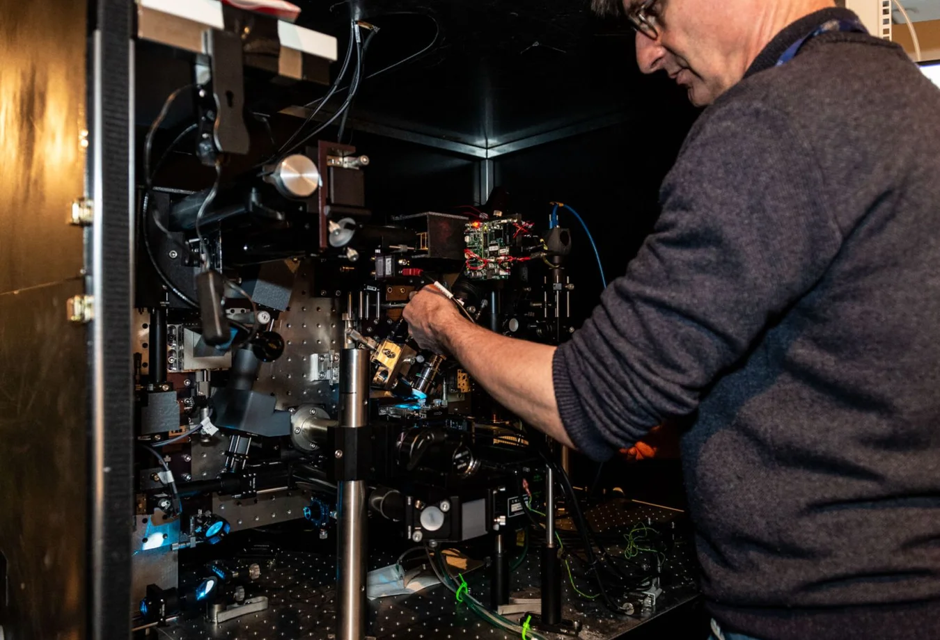 A faculty member operates lab equipment at the University of Bordeaux in France.