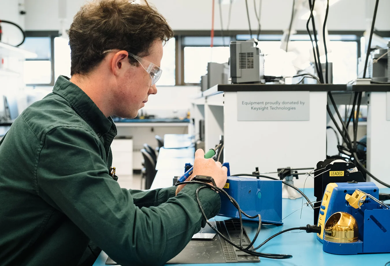 A Mines Electrical Engineering student works in a lab in the Electronics Discovery Center on campus.