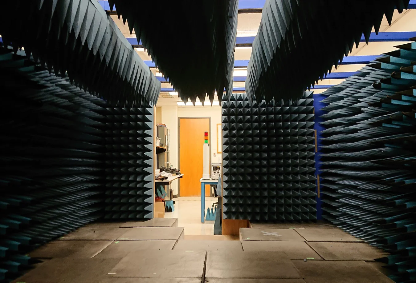 A room filled with lots of blue acoustic panels.