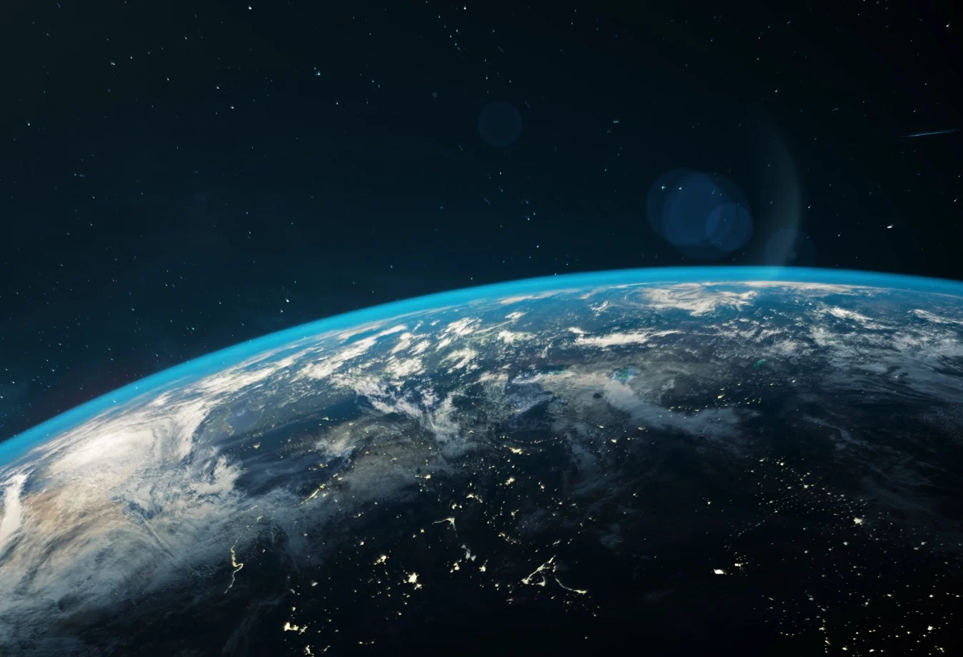 A rendering of Earth from space, showing the planet's blue atmosphere against the darkness of space