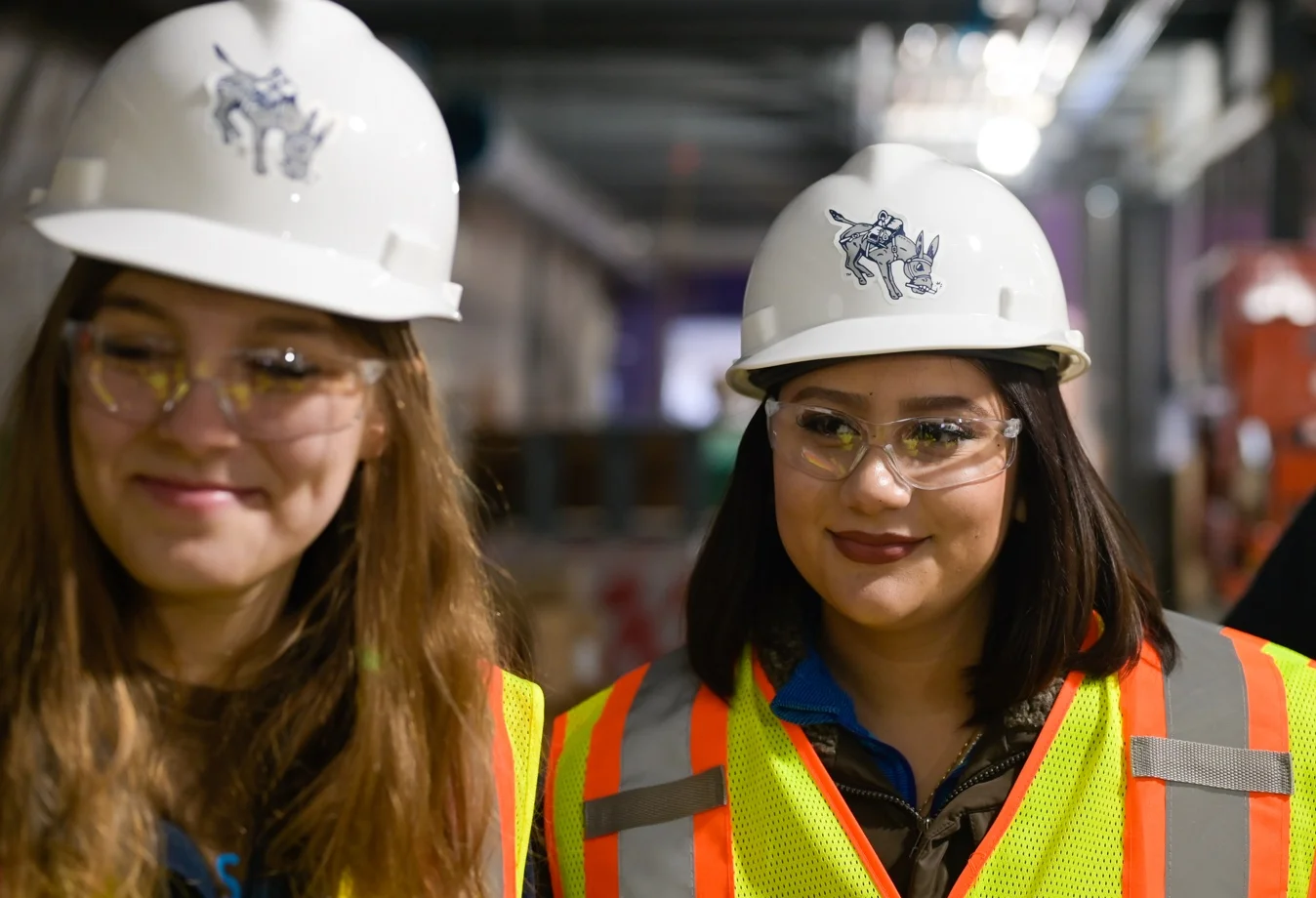Mines students wearing safety gear on the construction site.