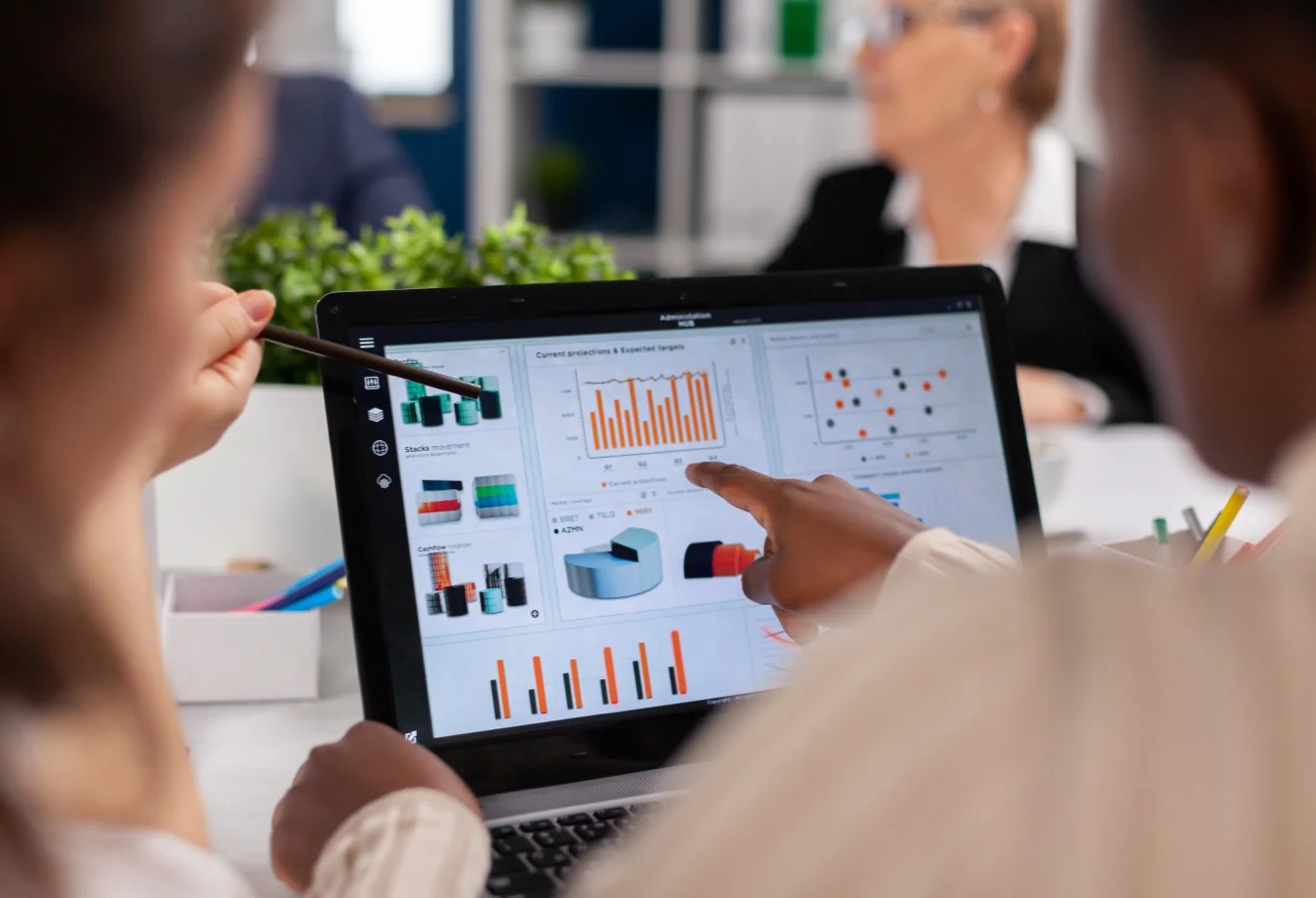 Insights displayed on a laptop screen showing a modern corporate data analytics dashboard for monitoring financial performance