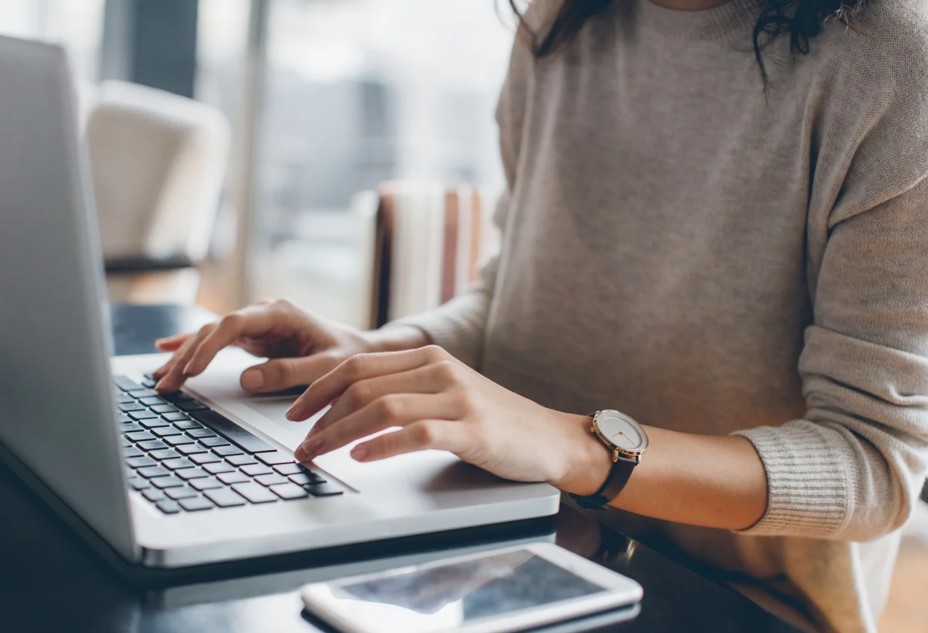 A woman working on her laptop