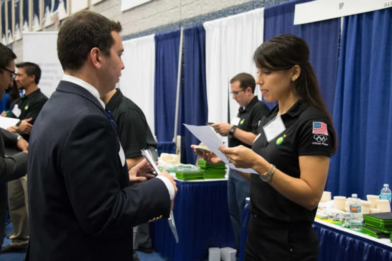 Mines student sharing a resume at the Career Fair