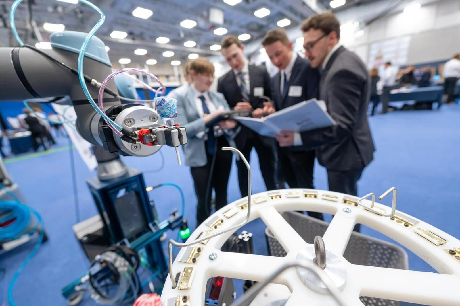 Mines students review business plans for a new engineering project.