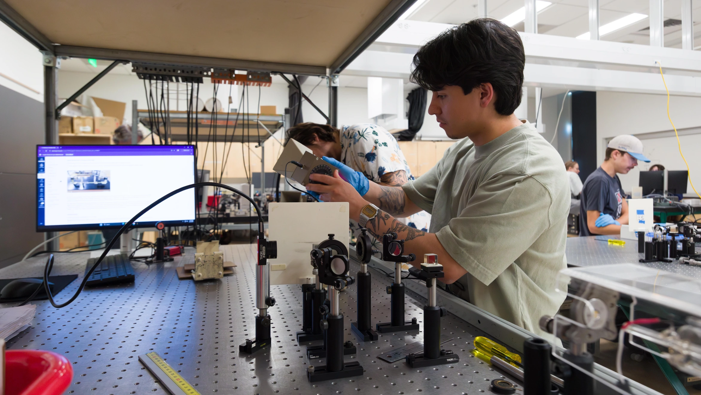 A group of people working in a lab.
