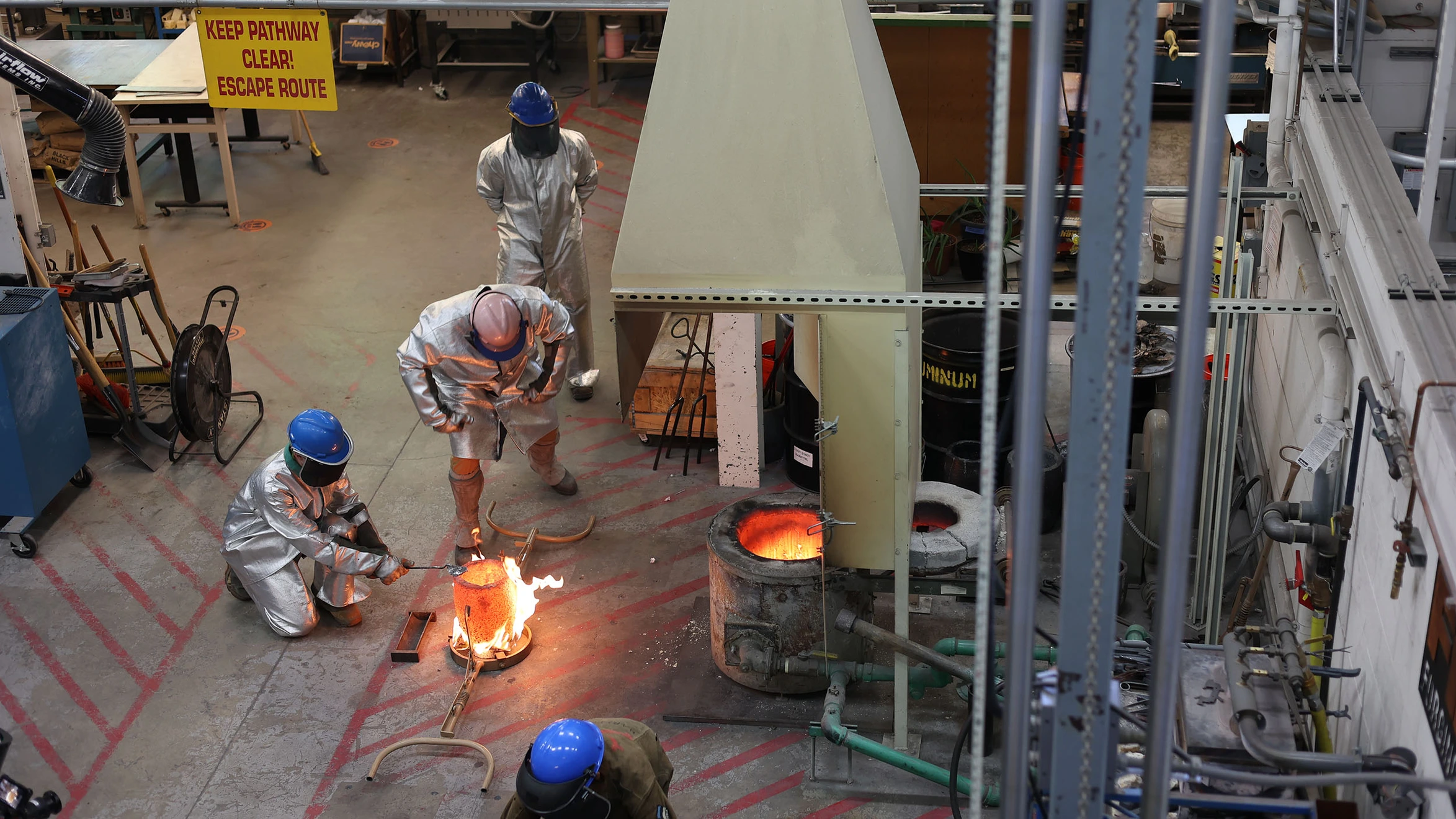 A group of men working in a factory.
