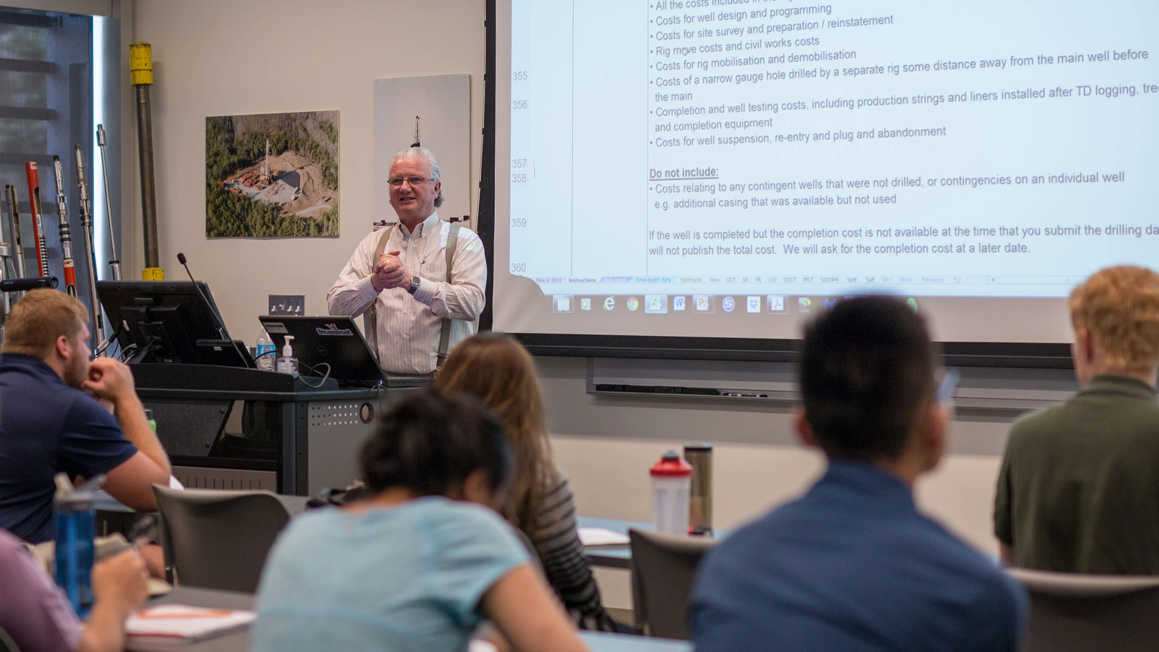 A man giving a presentation to a group of people.