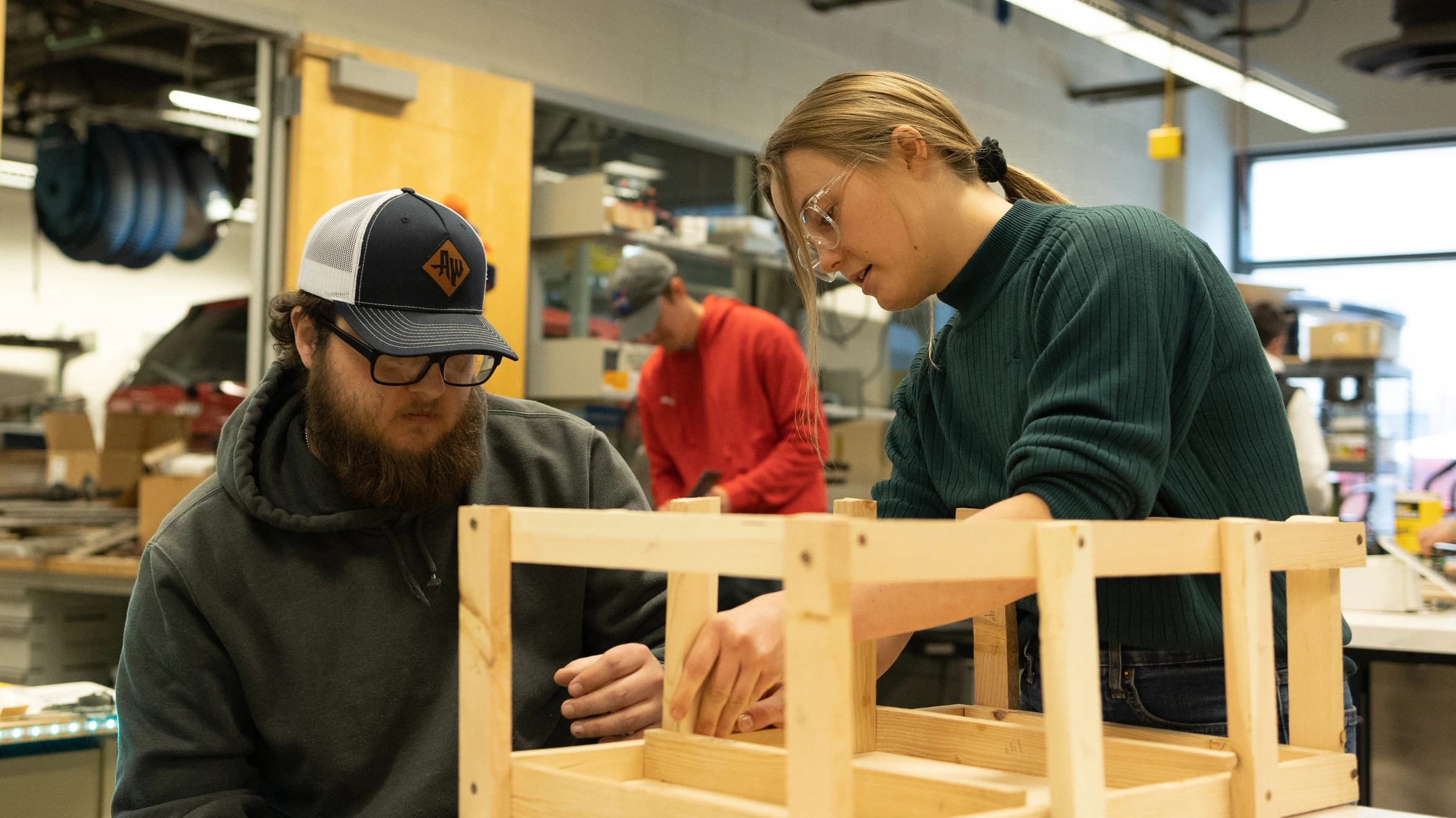 Students build a wooden frame as part of the Structural Engineering program senior design project.