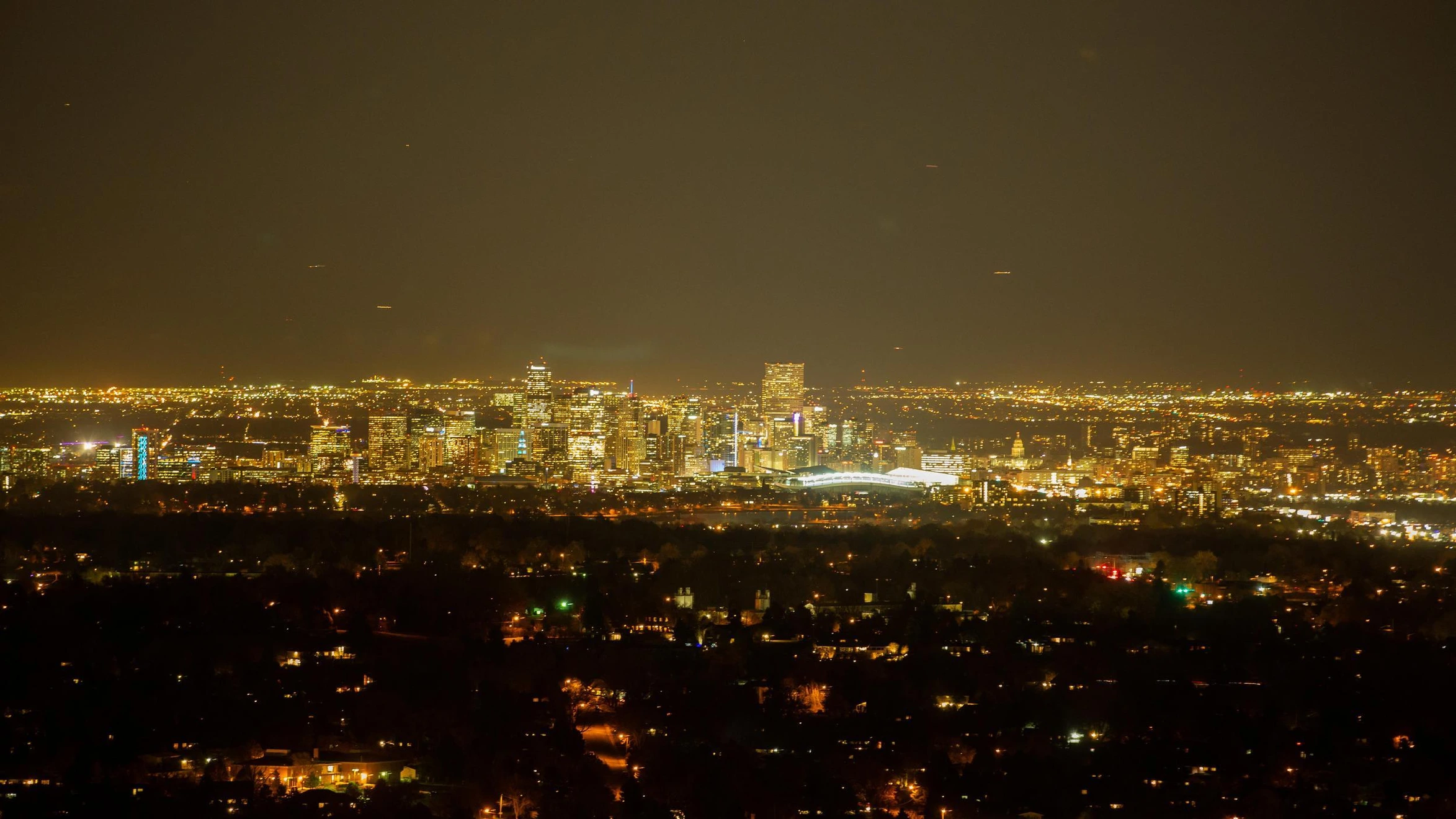 Denver's electrical grid on display in this photo of the heart of the city lit up at night.