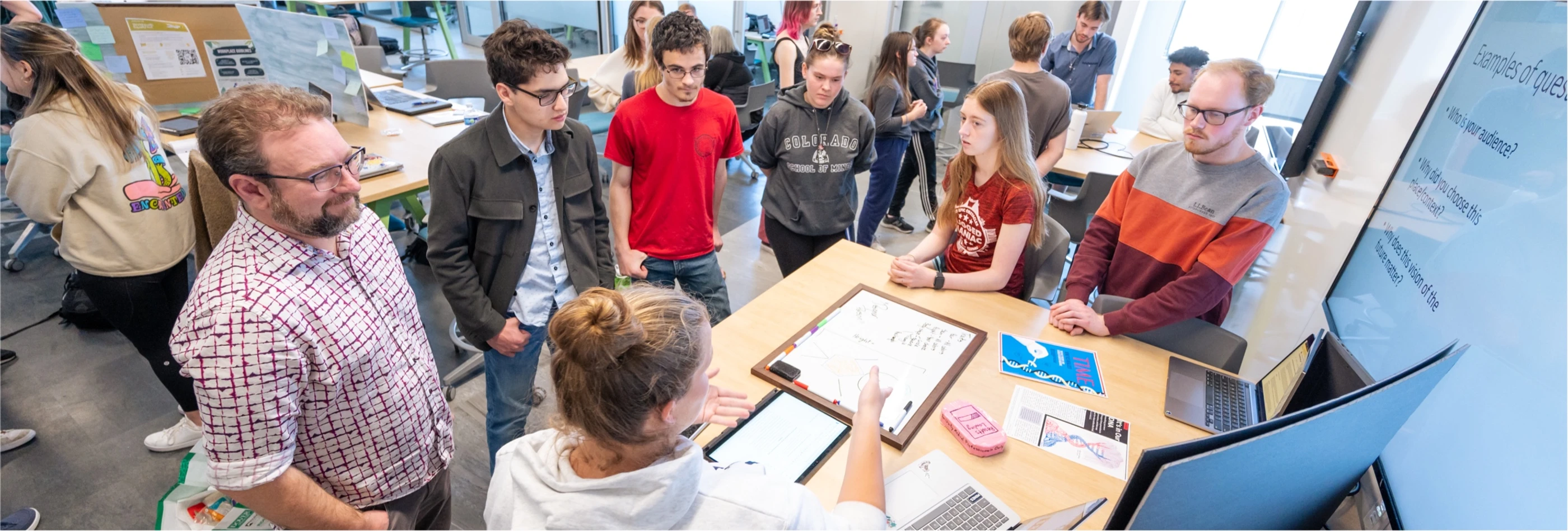 Mines students attending capstone research presentations