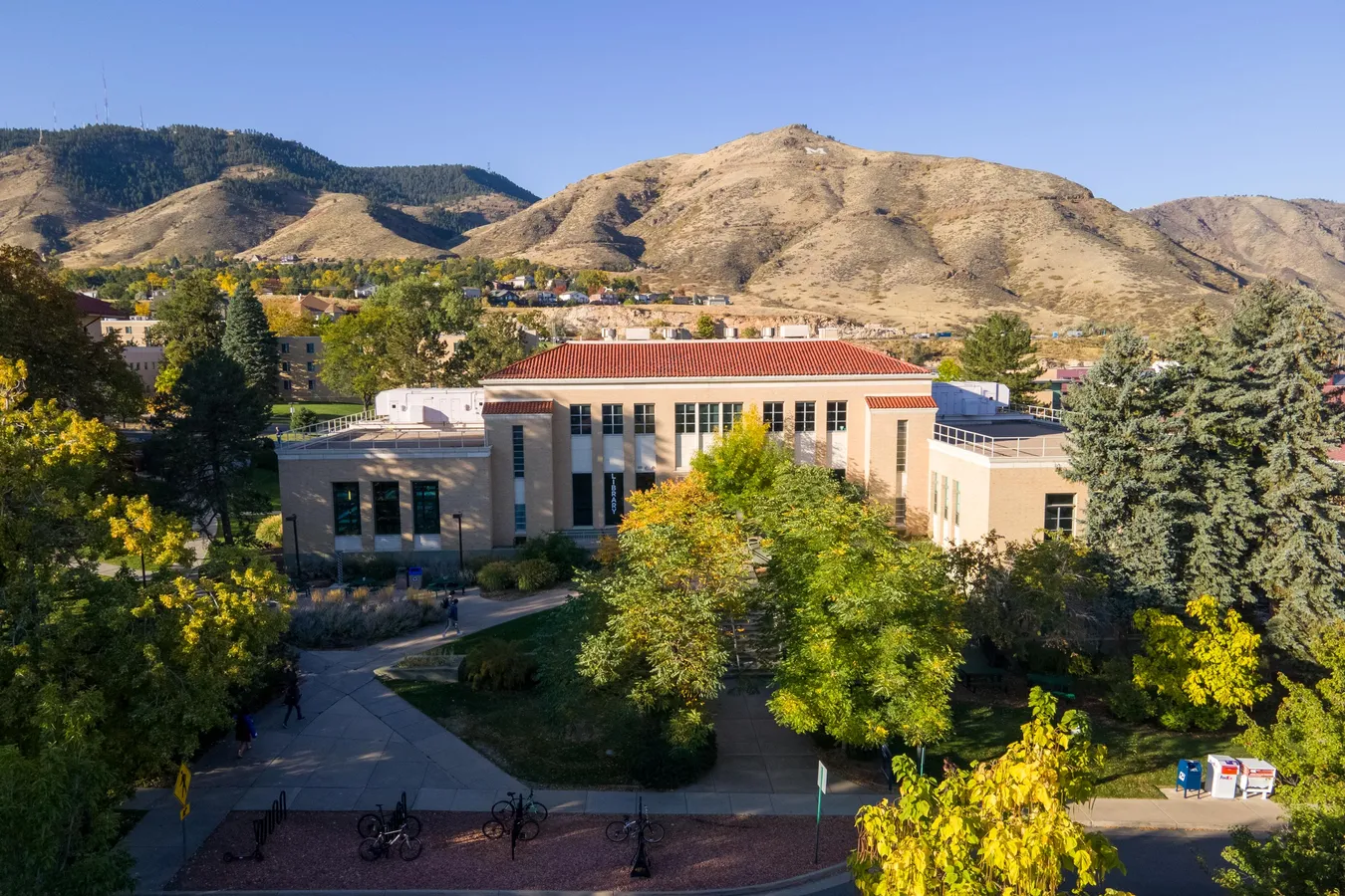 Arthur Lakes Library from above in fall with Mount Zion in background