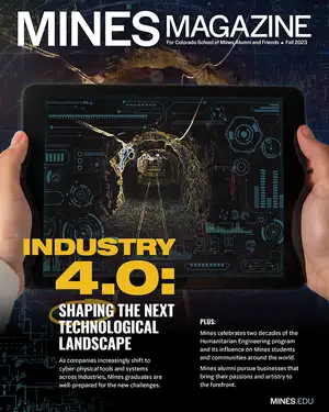 Cover of Mines Magazine Fall 2023 showing hands holding a tablet with a digital mining tunnel and Industry 4.0 technology theme.