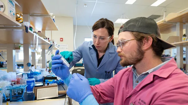 Nuclear Scientist Jenifer Shafer works with a grad student in the radio chemistry lab at Mines.