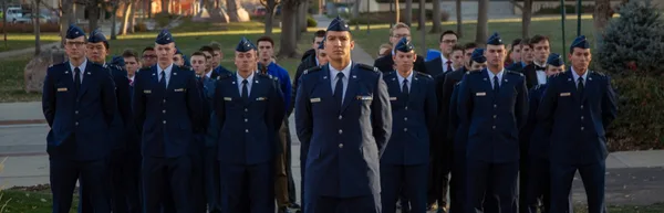 Mines Air Force Cadets in uniform standing at attention