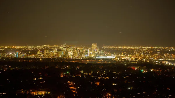 Denver's electrical grid on display in this photo of the heart of the city lit up at night.