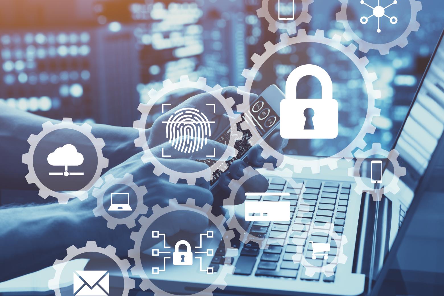Computers with digital padlocks symbolizing cybersecurity and secure data.