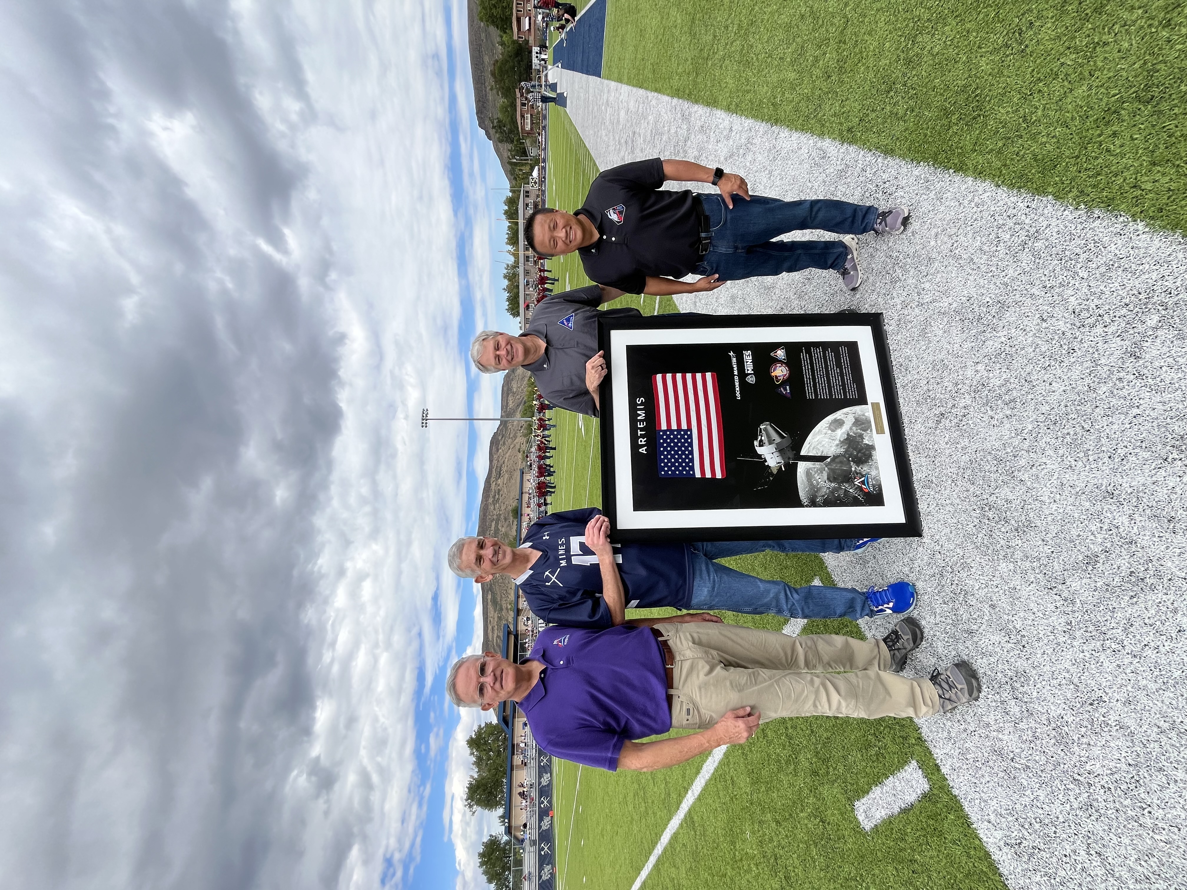Lockheed Martin presents NASA artifact at Mines football game