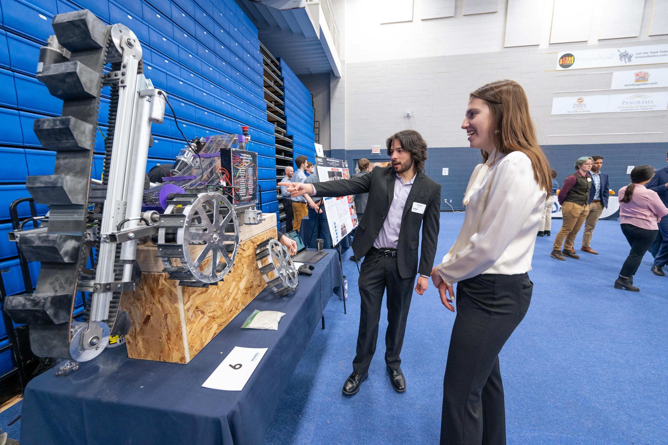 A student talks about their Capstone Design project in Lockridge Arena