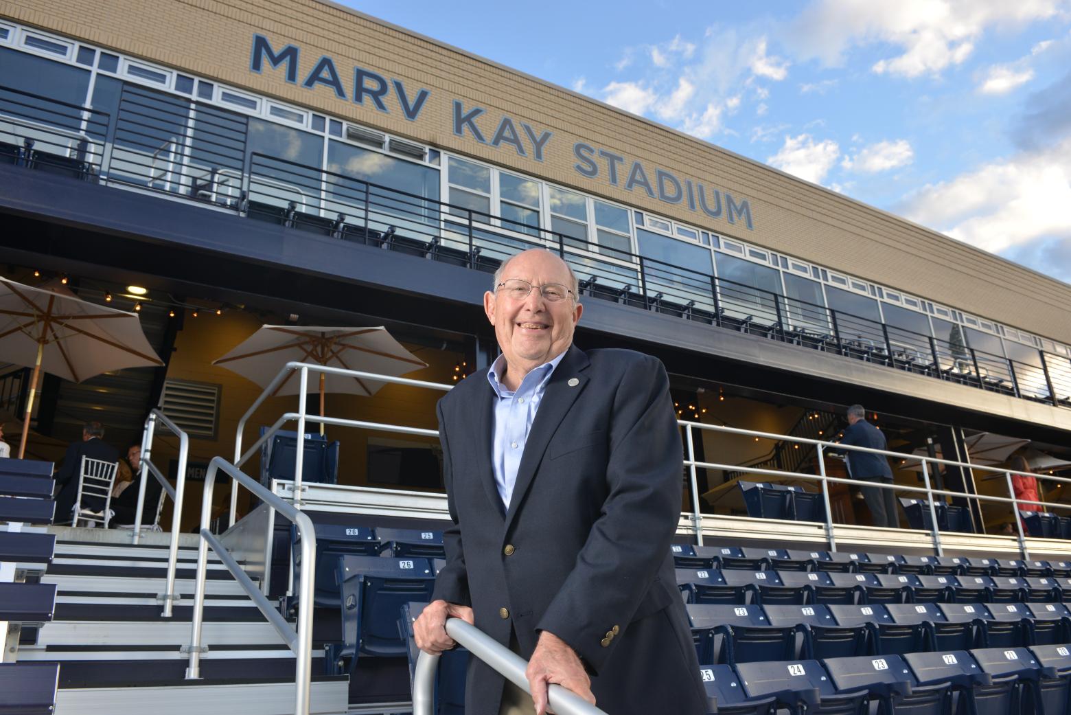 Marv Kay standing in the football stadium
