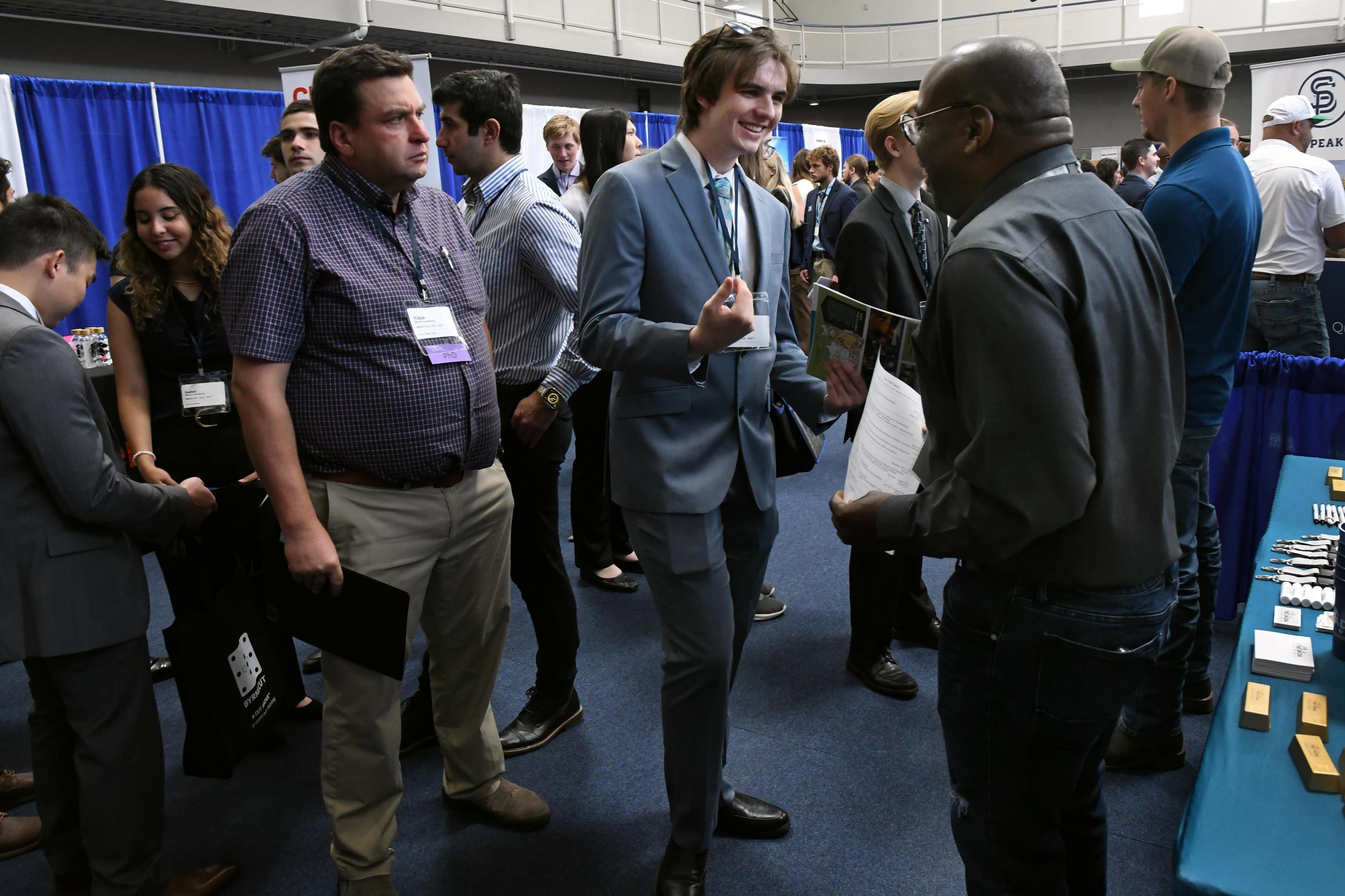 Student talk with a recruiter at Career Days
