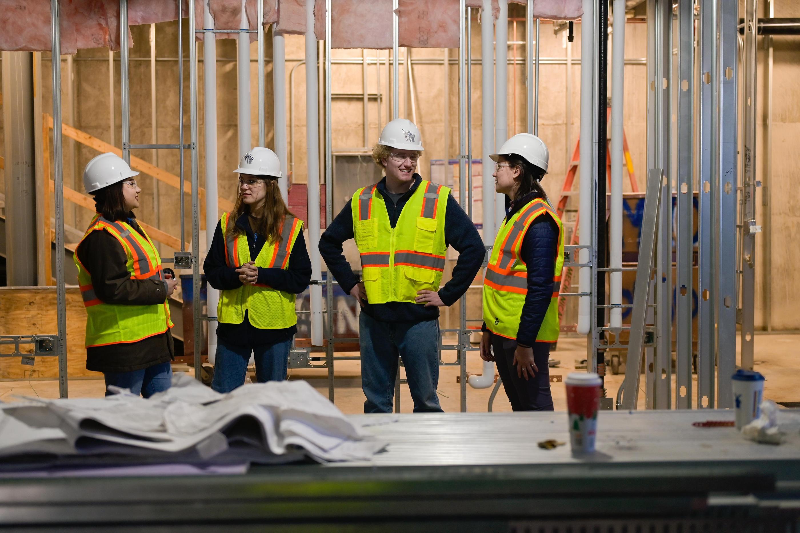 Construction engineering students meet at under construction Beck Venture Center