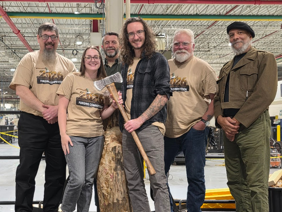 Mines students pose with their winning axe
