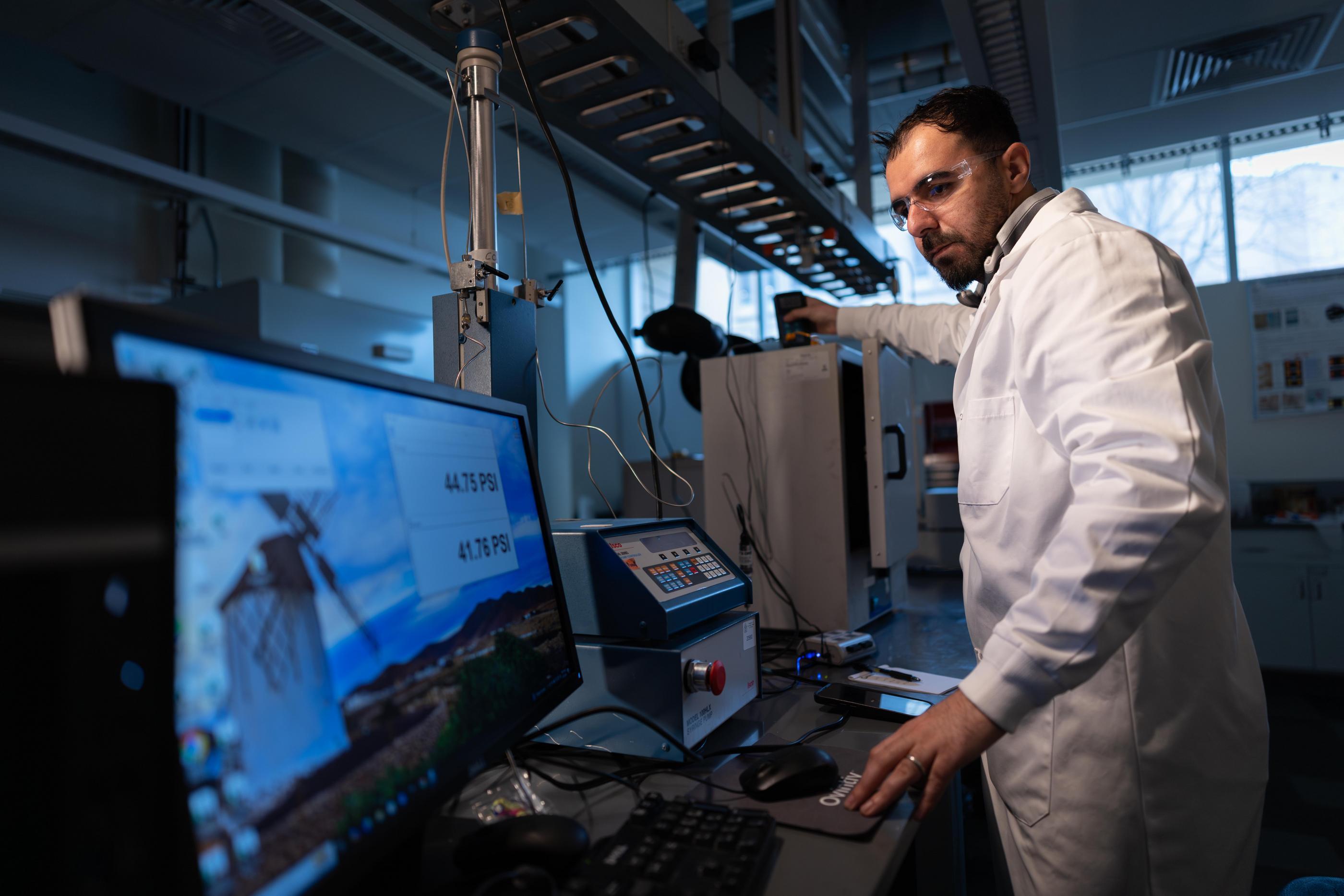 Abdesselem Dehdouh, a PhD candidate in petroleum engineering, in geothermal fluid characterization lab