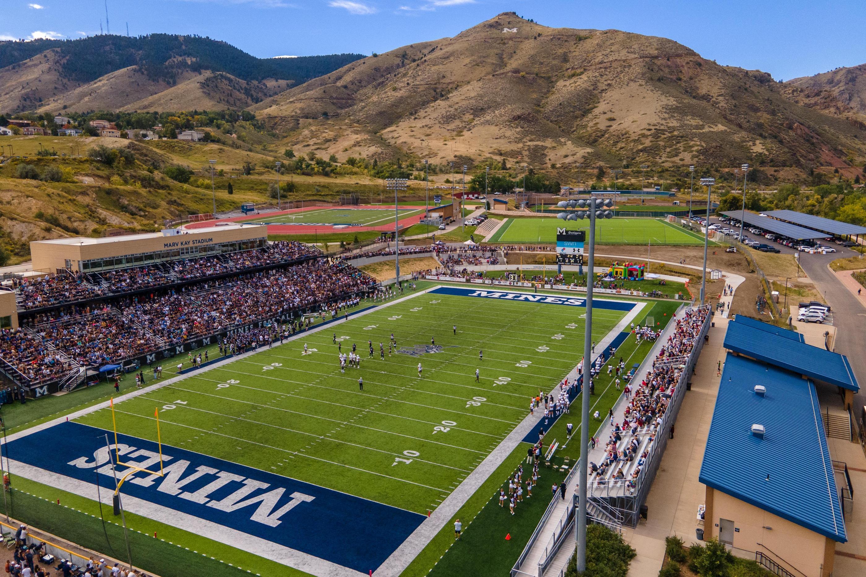 aerial view of Marv Kay Stadium during football game with Mt. Zion in background