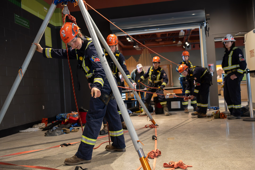 students in safety equipment work on mine rescue challenge