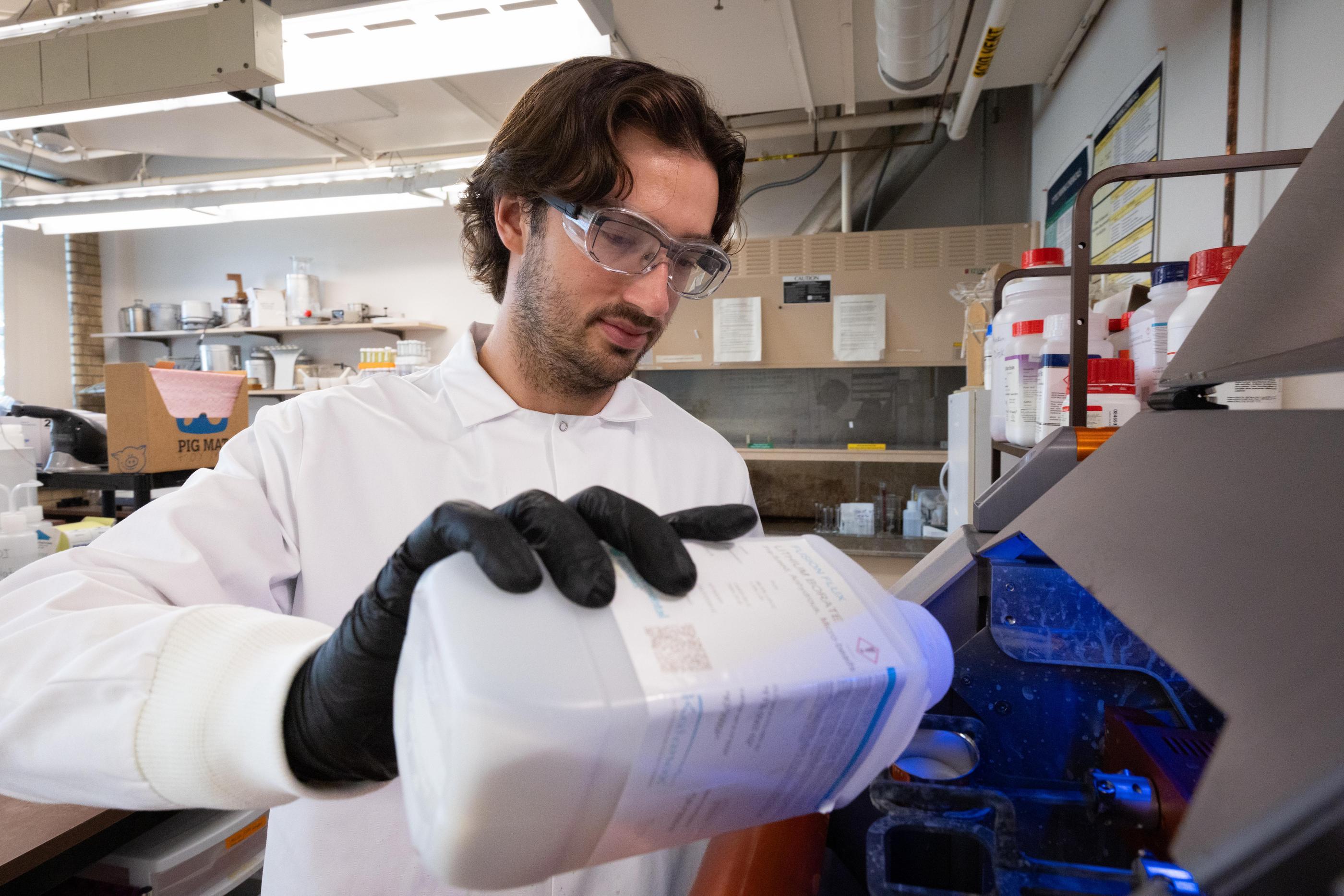 A graduate student works in the lab at the Kroll Institute for Extractive Metallurgy