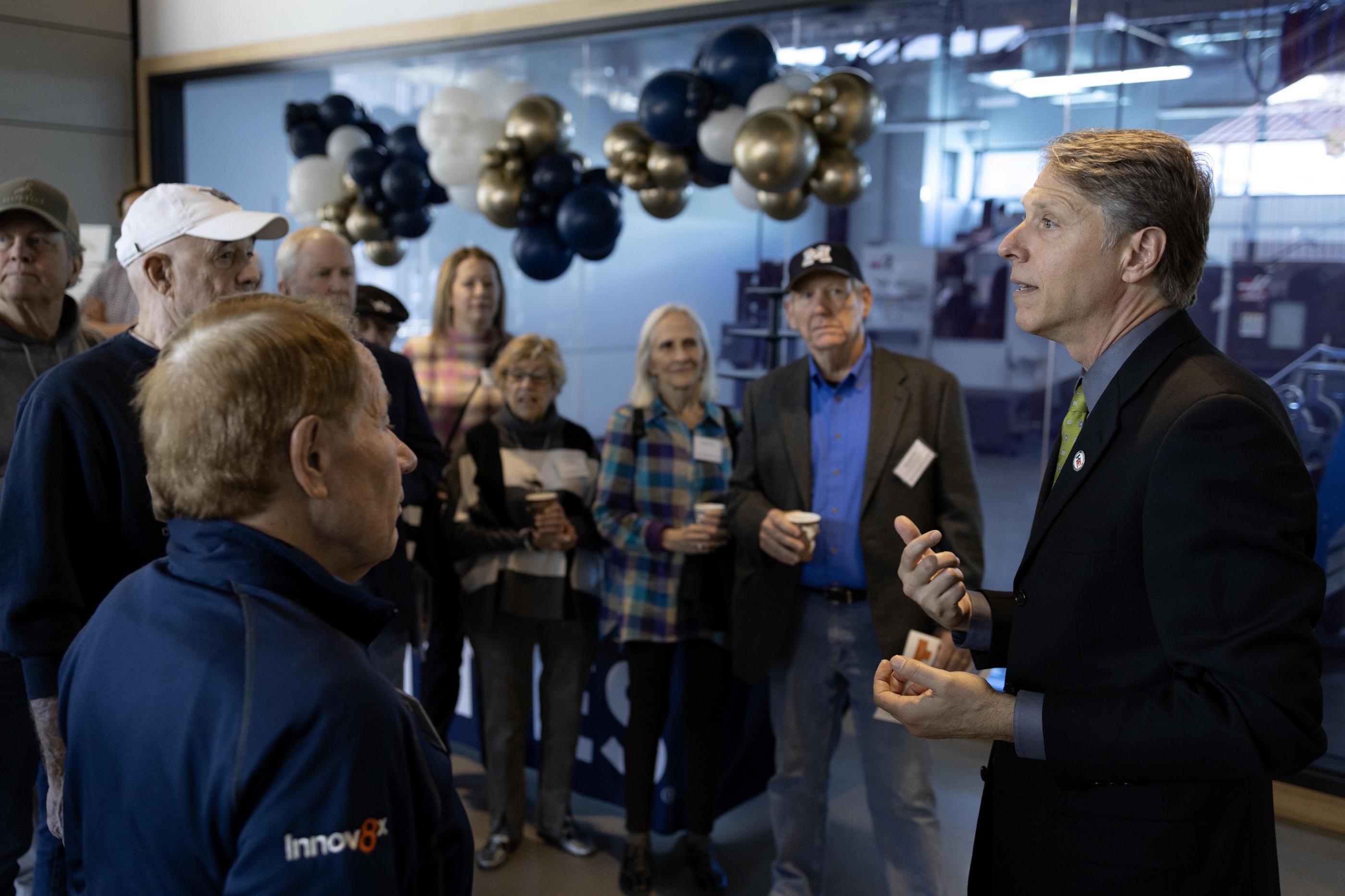 Dean Nieusma talks to a group of alumni inside the Labriola Innovation Hub
