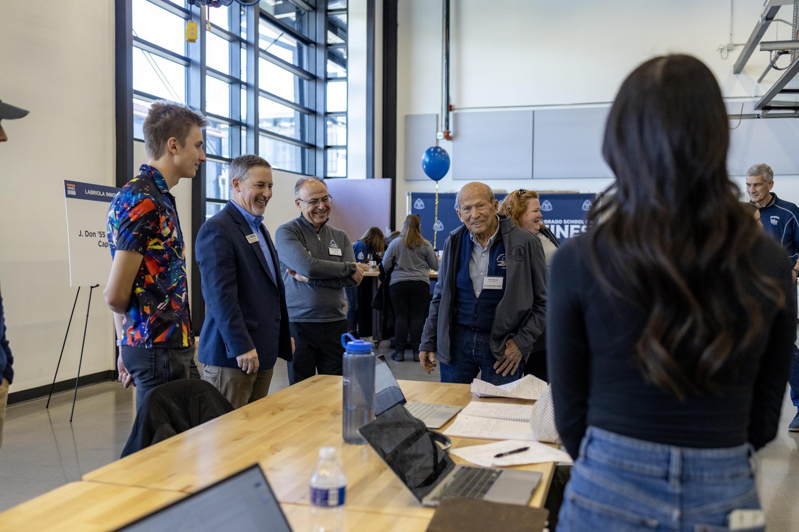 Don Thorson talks with students in the Capstone Lab