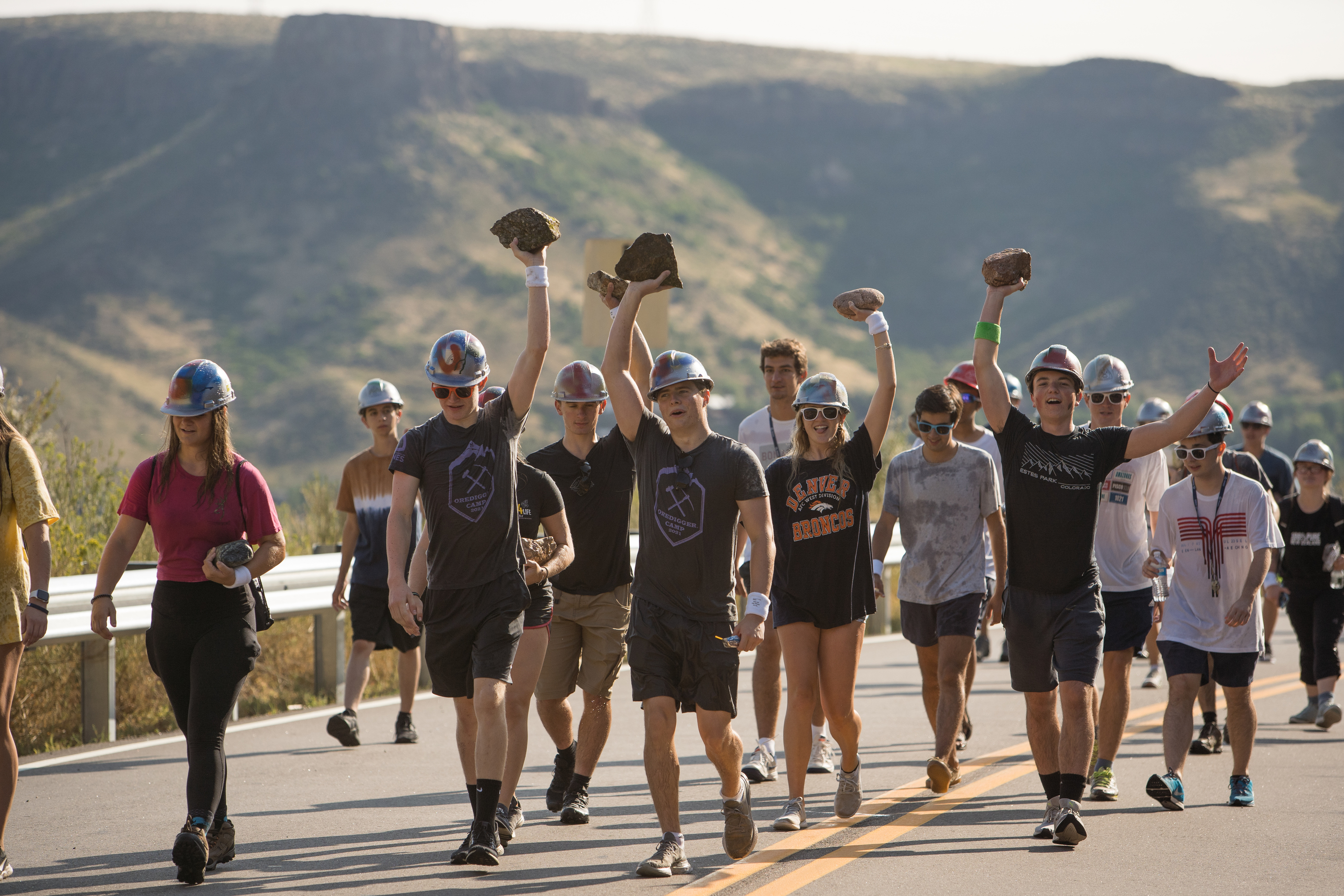 Mines M Climb 2021 students carrying rocks