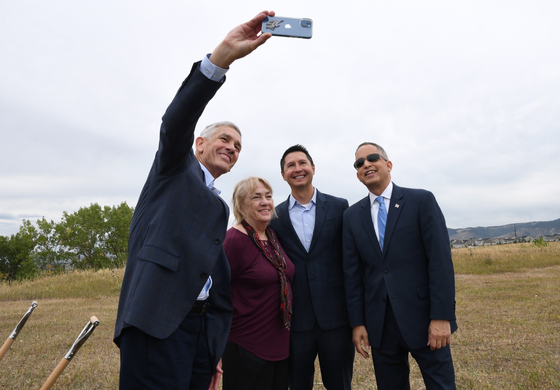 President Johnson takes a selfie at the Quantum Commons groundbreaking