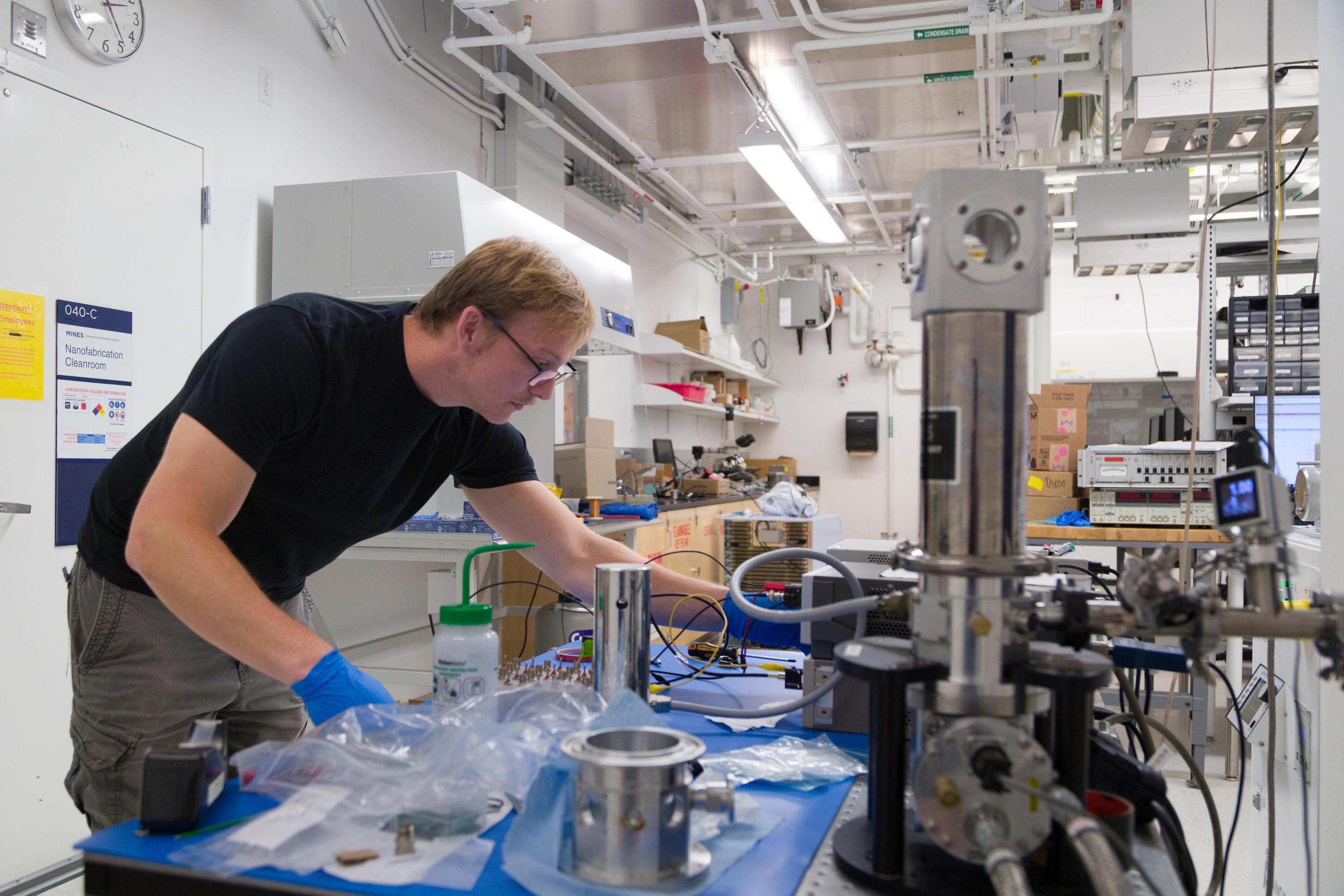 Connor Denney works in a quantum lab