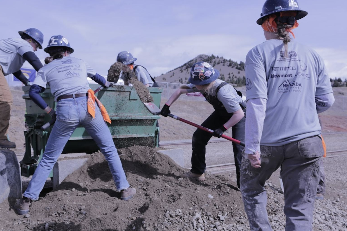 Shoveling ore during the Mucking Competition