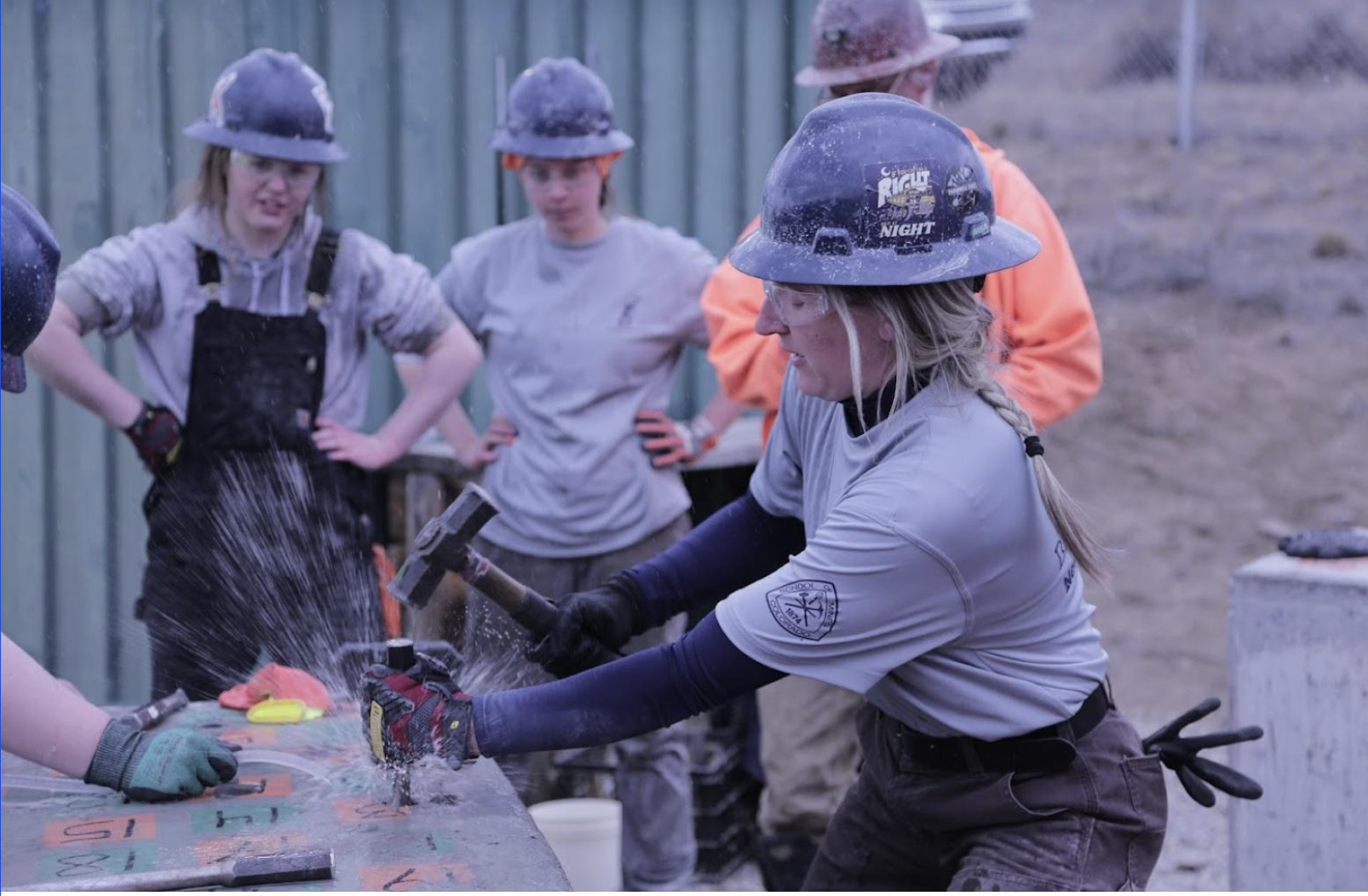 Mines student Emilee Sloan competes during the Hand Steel event at the 2024 International Mining Games.