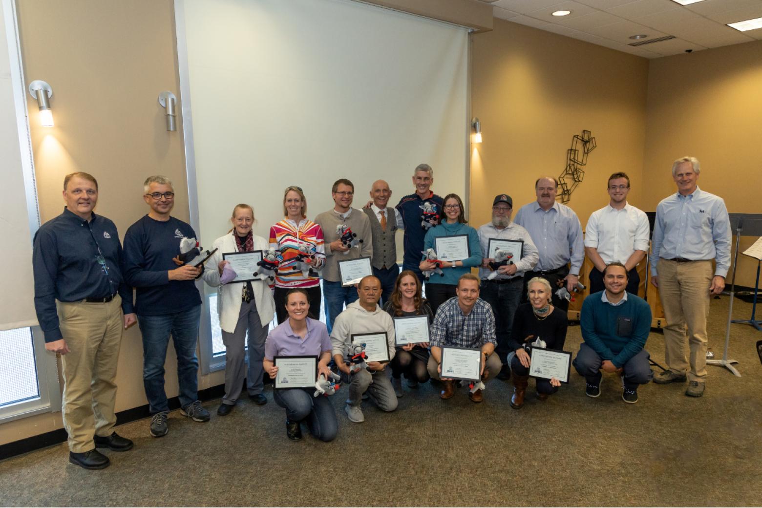 Staff posing for a photo during the 2023 Academic Faculty Awards