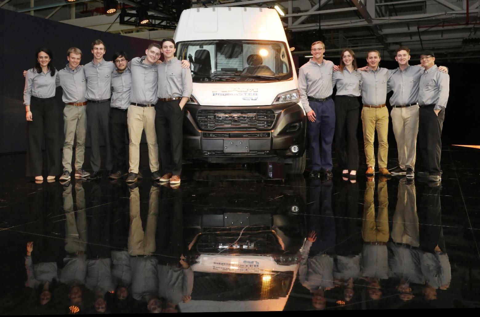 Mines and ACC students pose with Ram Promaster van
