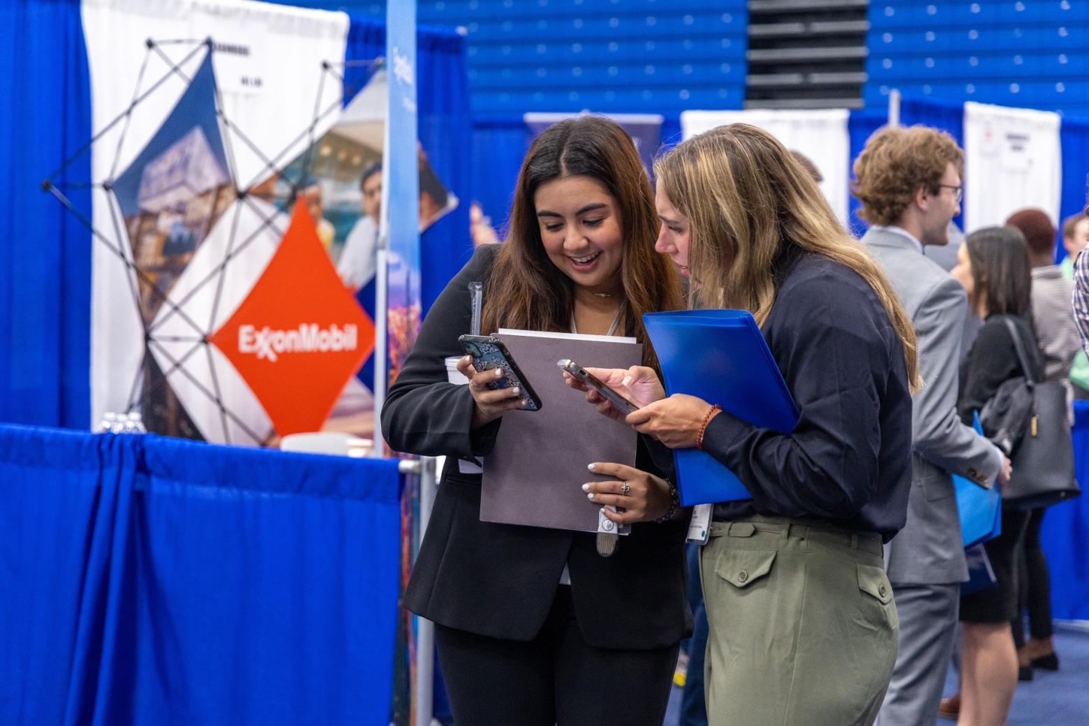 Students review their schedules during the first day of Fall Career Days.