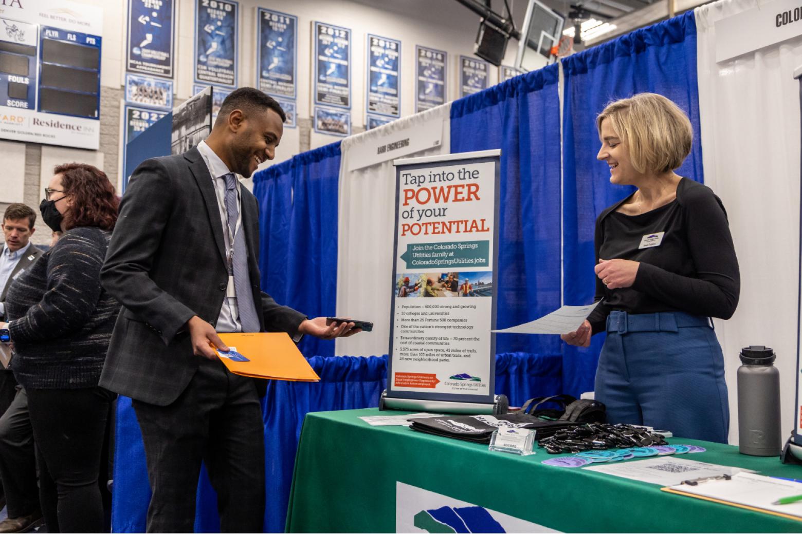 Chemical engineering senior Mulugeta Dereso meets with a recruiter from Colorado Springs Utilities