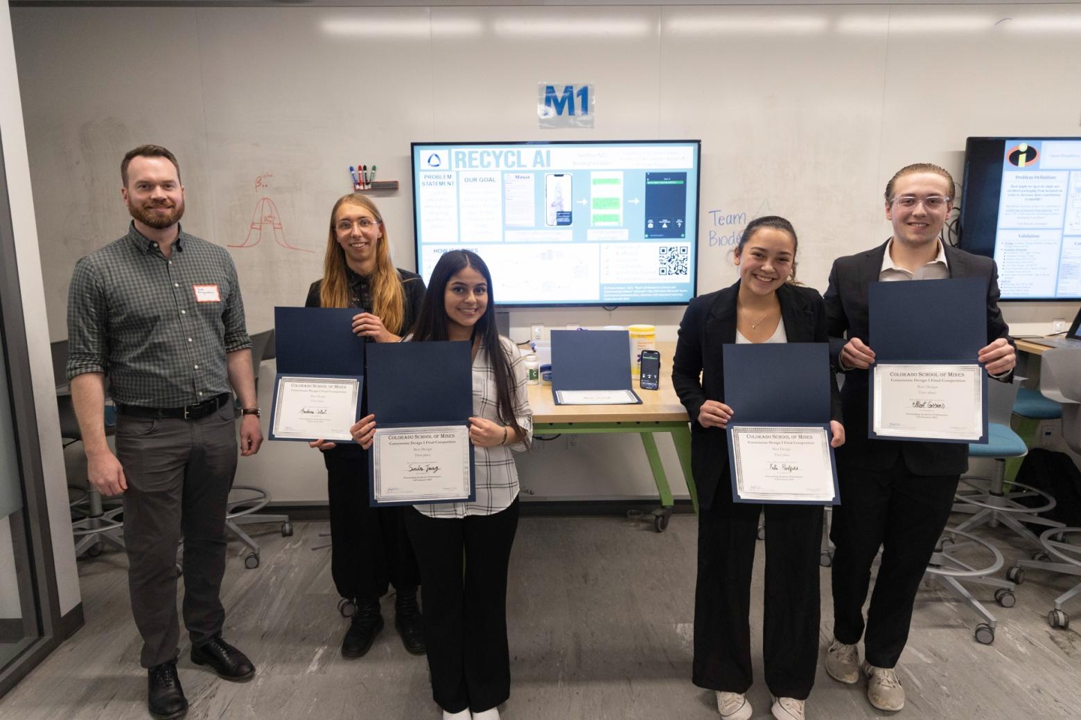Colorado School of Mines Cornerstone Design student winners pose holding their certificates.